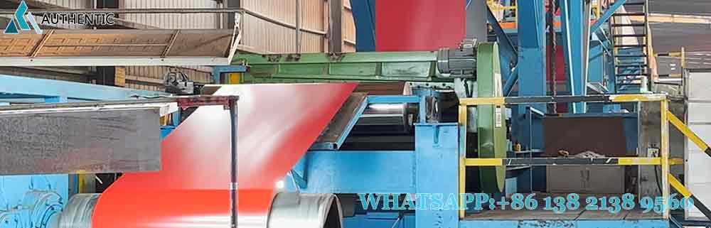 Automated processing machine handling continuous prepainted galvanized PPGI steel coil with consistent paint thickness at Authentic Steel factory.