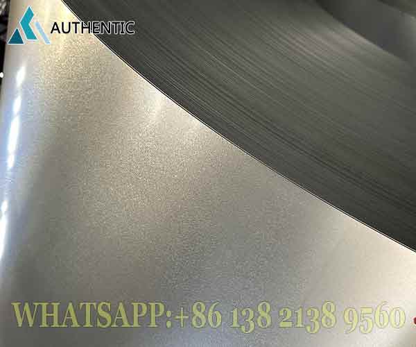 Detail spangle (bunga seng) pada permukaan BJLAS yang menawan, menjamin kualitasyang sebanding dengan harga galvalume coil SNI kami.