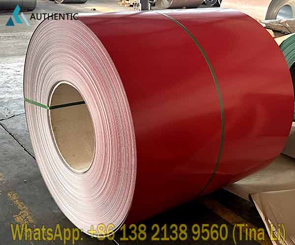 Premium prepainted galvanized steel coil rolls securely packed and stored in the warehouse for reliable bulk steel procurement.