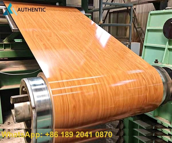 Advanced printing production line applying realistic timber texture onto wood grain printed PPGI steel coil at high speed.